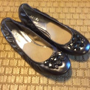 Michael Kors flats.